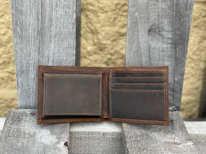 Zep-Pro Lab Concho 1/2 Mossy Oak Camo/Brown Bi-fold Wallet inside view shows:
Brown distressed leather
3 interior credit card slots
2 interior pockets
1 pullout ID case
2 bill-cash compartments